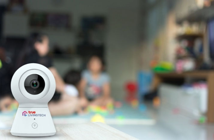 A picture containing person, indoor, child, camera  Description automatically generated