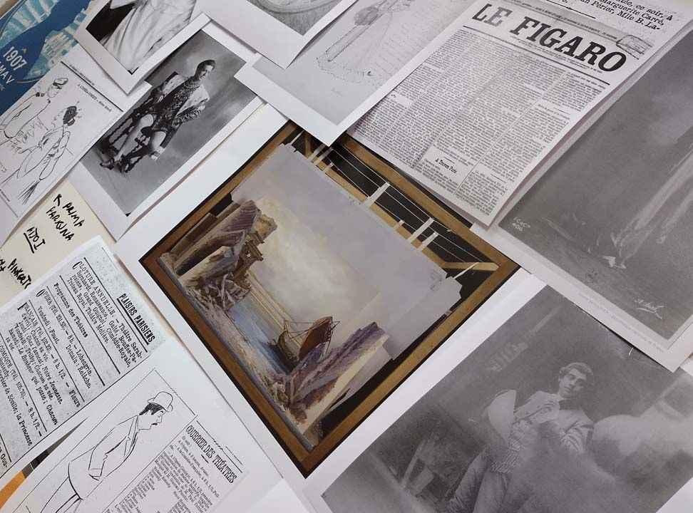 7.	The creative team examines reference material for the production คณะสร้างสรรค์งานตรวจสอบเอกสารอ้างอิงสำหรับออกแบบการแสดง