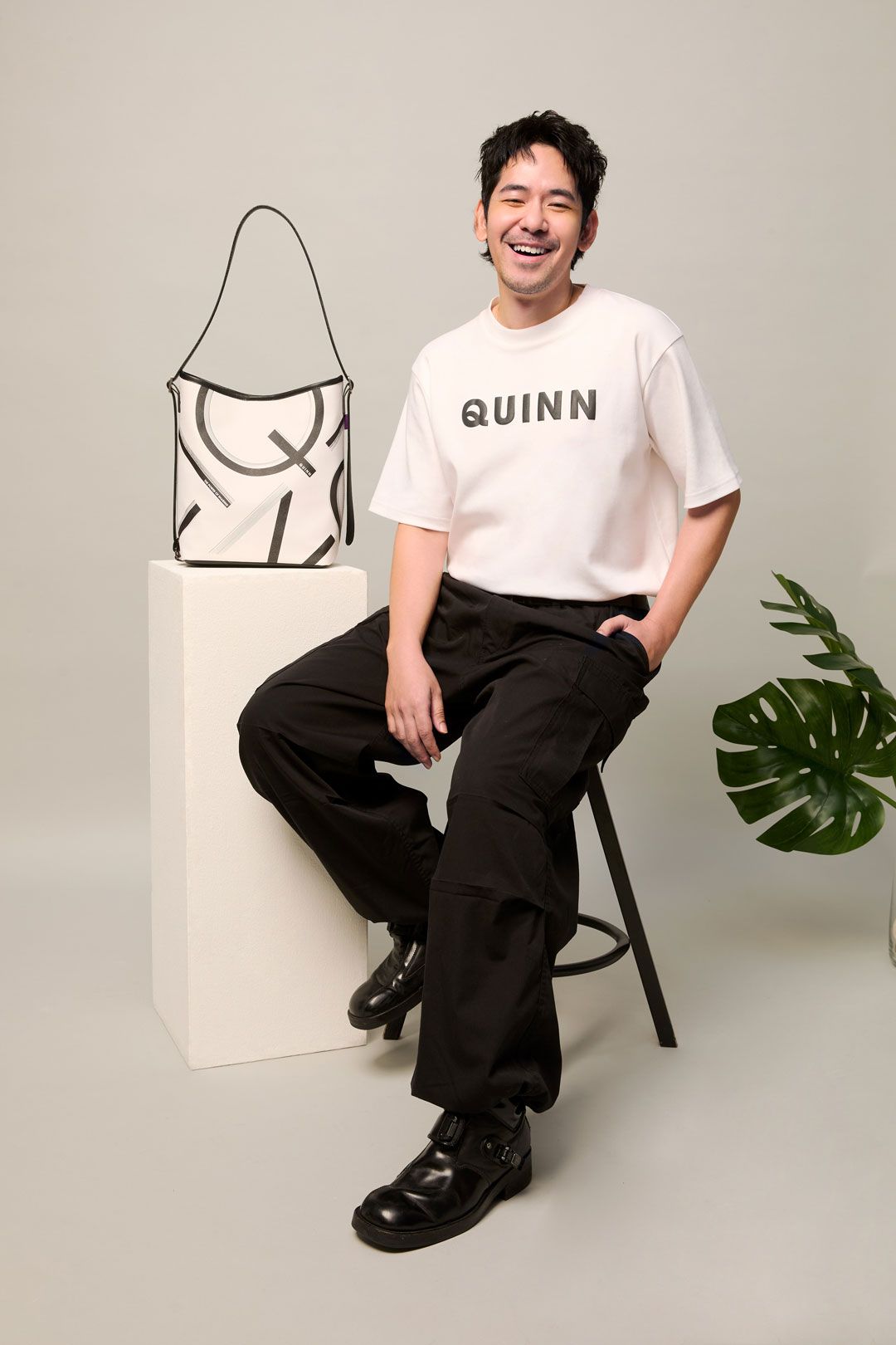 เกื้อบุญ ชวนบุญ ดีไซเนอร์แบรนด์ QUINN