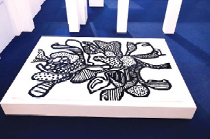 พรมยิงมือ ออกแบบโดย สมบัษร ถิระสาโรช