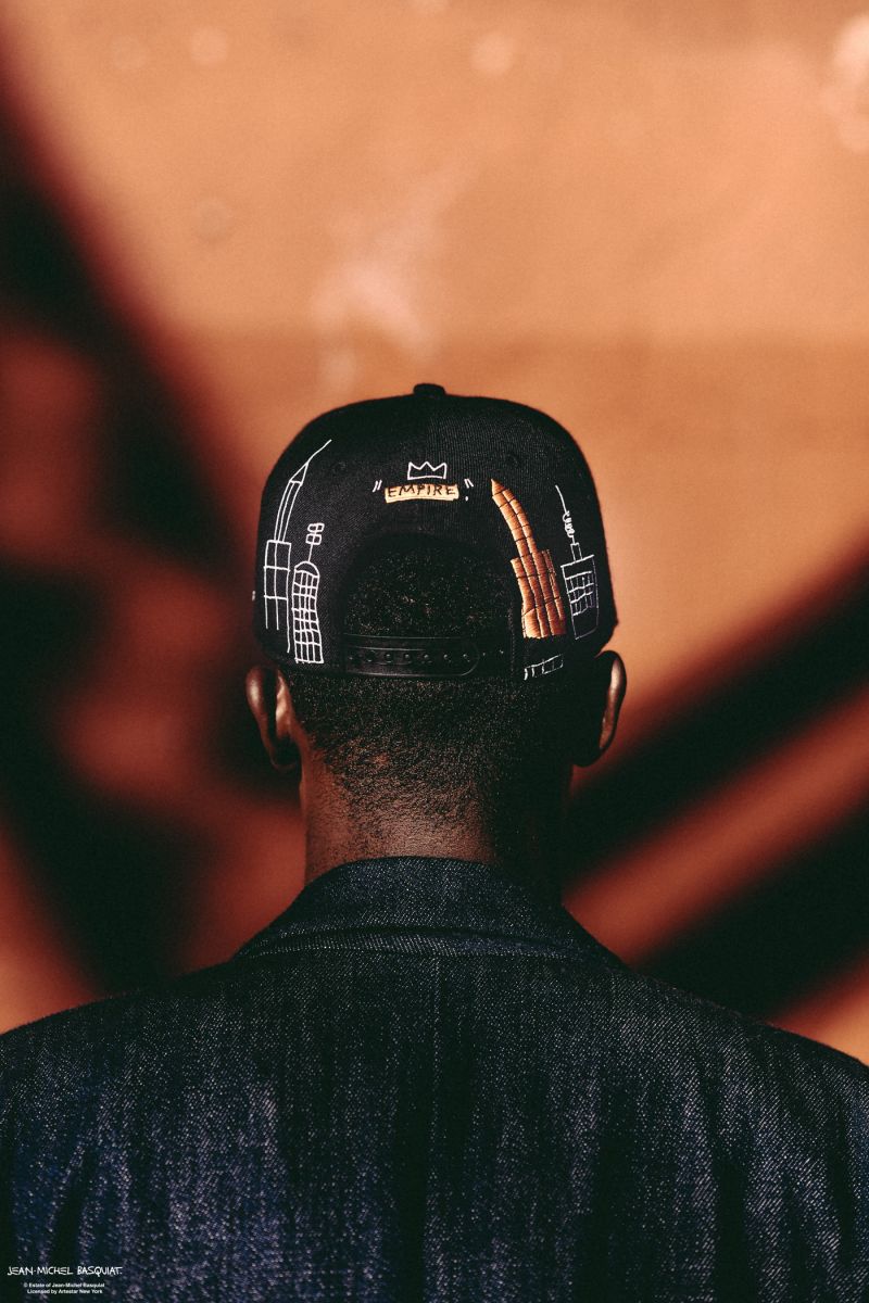 New Era X Basquiat Empire: หมวก 9FIFTYs เหล่านี้แรงบันดาลใจมาจาก Basquiat’s New York heritage ซึ่งมีงานศิลปะ \