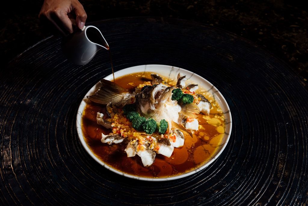 Steamed Whole Leopard Coral Grouper, Yellow Pepper Sauce (ปลาเก๋าดอกแดงนึ่งซอสพริกหวานเหลืองสูตรต้นตำรับ)