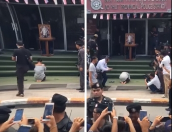 ชาวบ้านกดดัน\'สาวโพสต์หมิ่น\' กราบขอขมาพระบรมฉายาลักษณ์ (ชมคลิป)
