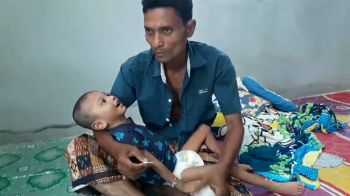พ่อวอนช่วยลูกชาย  พิการสมองติดเชื้อ  ทุ่มรักษาจนหมดตัว