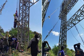 ลุ้นระทึก!​ เร่งช่วยชายวัย 50 วูบชักเกร็ง​ ติดบนป้ายโฆษณาสูง 20 เมตร
